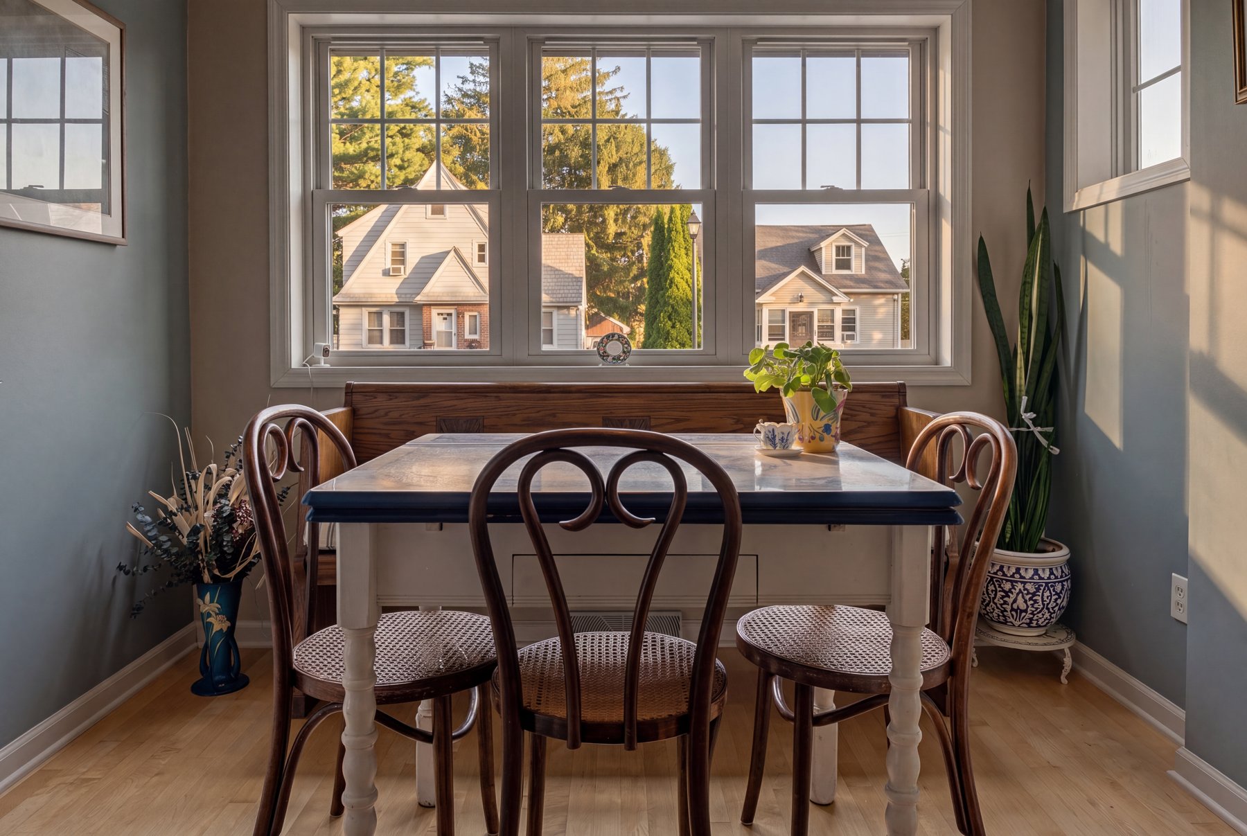 A sunlit breakfast nook, styled and photographed by Phocasa
